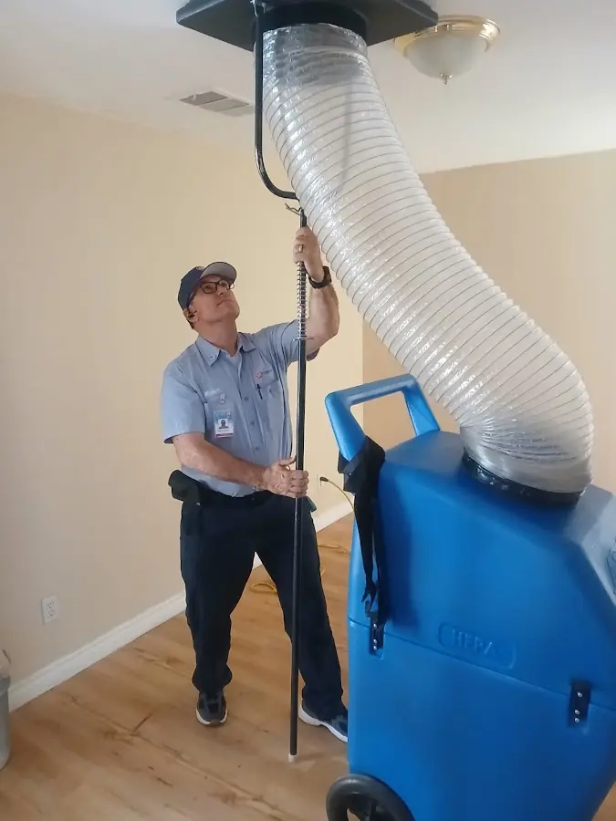 HVAC Installation technician using HEPA equipment in Horace